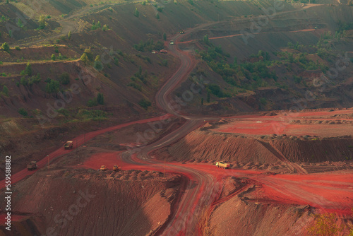 Iron ore quarry landscape with transport