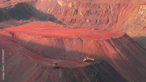 Iron ore quarry landscape with transport
