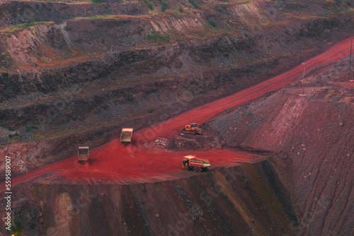 Iron ore quarry landscape with transport