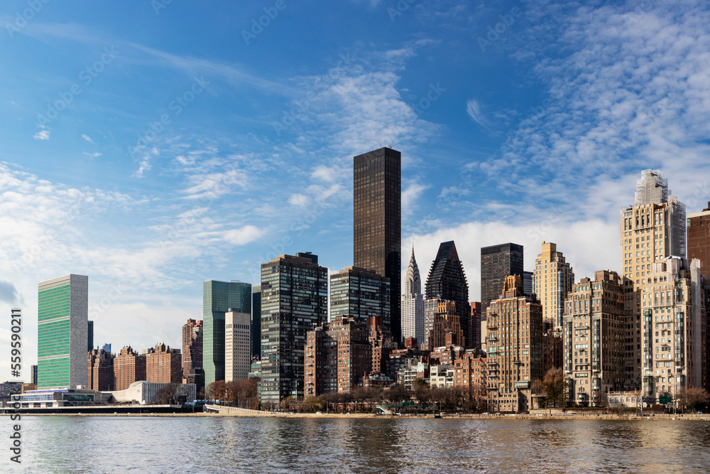 Naklejka premium The skyline of the Turtle Bay / Midtown East area of Manhattan on a fall morning, as viewed from Roosevelt Island.