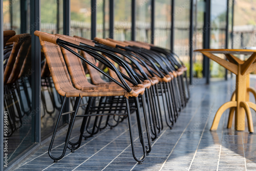 Empty chairs and table in street cafe , Vietnam, closeup