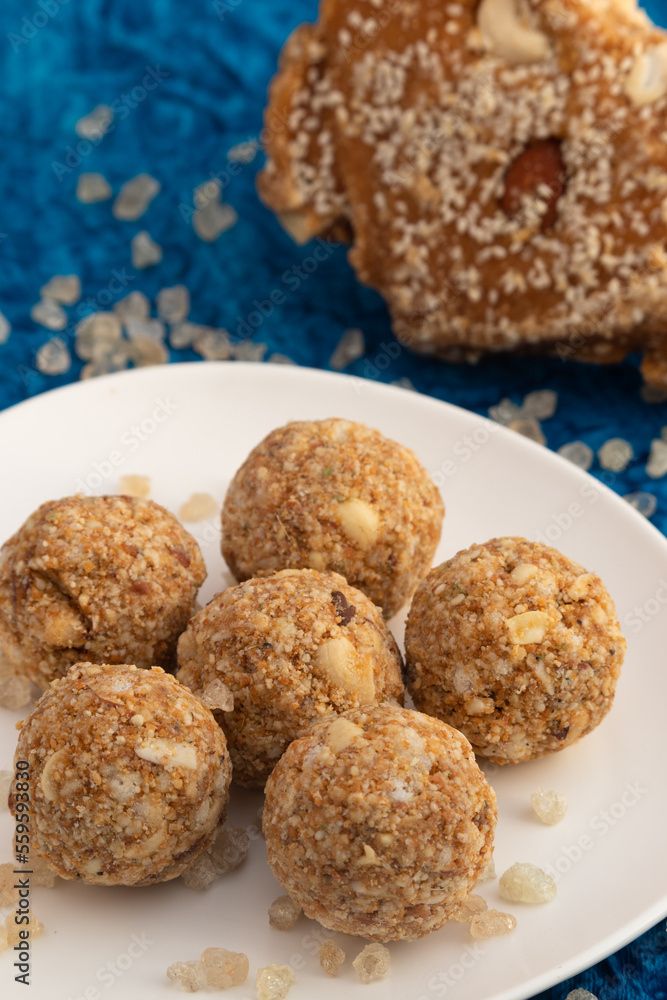 Gond ke laddu Also Called Karadantu, Antinaunde Gondh Ladoo Made Of Whole Wheat Flour, Tragacanth Edible Gum, Khus Khus, Badam, Gud, Ghee, Jaggery, Gur, Coconut, Dry Fruits. Preganant Woman Diet Food Gond ke laddu Also Called Karadantu, Antinaunde Gondh Ladoo Made Of Whole Wheat Flour, Tragacanth Edible Gum, Khus Khus, Badam, Gud, Ghee, Jaggery, Gur, Coconut, Dry Fruits. Preganant Woman Diet Food