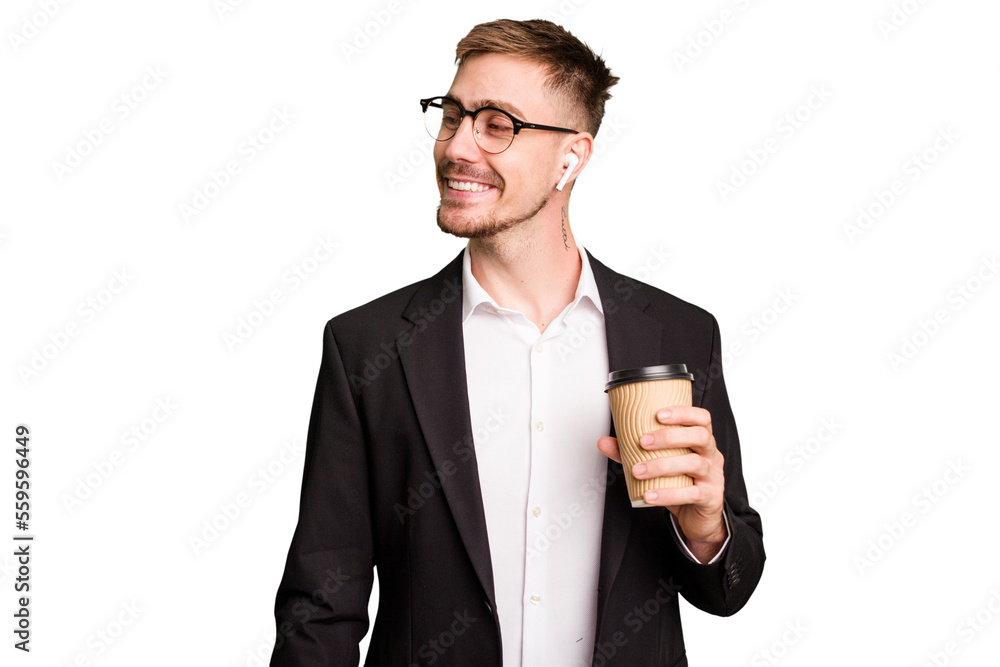 Young business caucasian man drinking a coffee isolated cutout looks aside smiling, cheerful and pleasant. Young business caucasian man drinking a coffee isolated cutout looks aside smiling, cheerful and pleasant.
