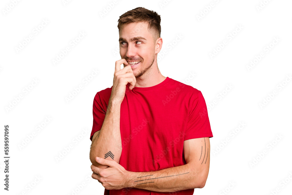 Young caucasian man cut out isolated relaxed thinking about something looking at a copy space. Young caucasian man cut out isolated relaxed thinking about something looking at a copy space.