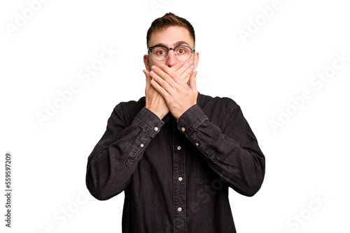 Young caucasian man cut out isolated covering mouth with hands looking worried.