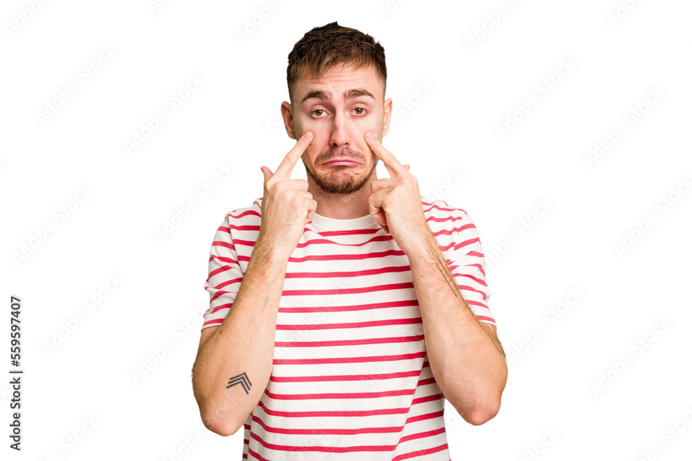 Young caucasian man cut out isolated crying, unhappy with something, agony and confusion concept. Young caucasian man cut out isolated crying, unhappy with something, agony and confusion concept.