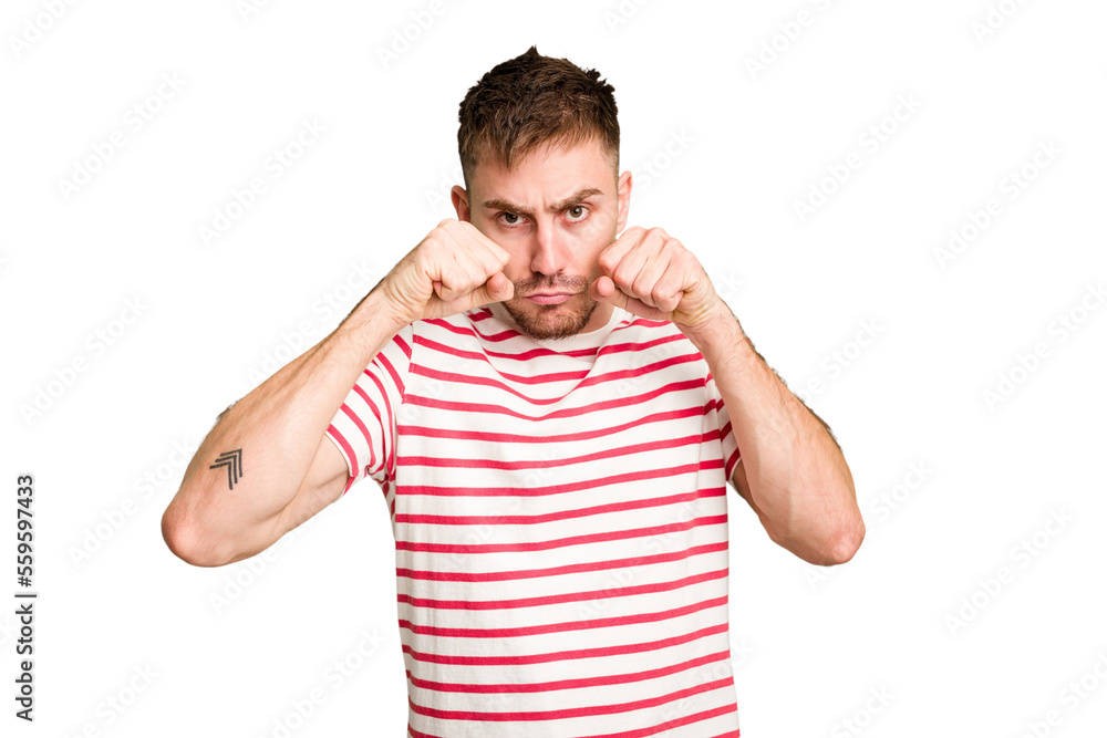 Young caucasian man cut out isolated throwing a punch, anger, fighting due to an argument, boxing. Young caucasian man cut out isolated throwing a punch, anger, fighting due to an argument, boxing.