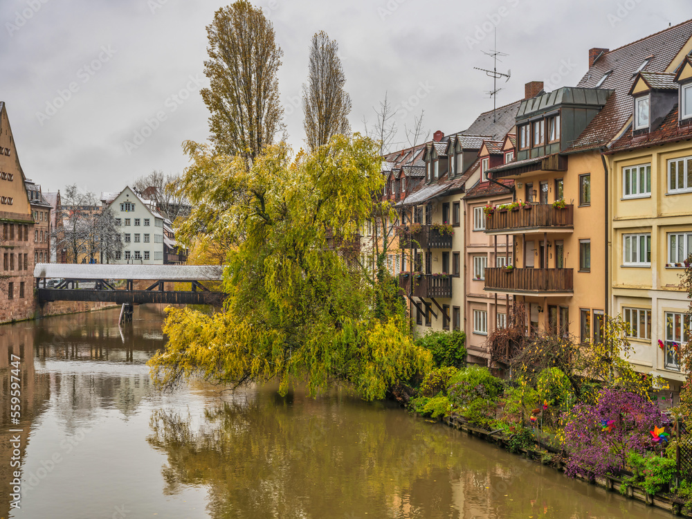 Beautiful historic buildings and Hangman's Bridge on Pegnitz river in Nuremberg, Germany
