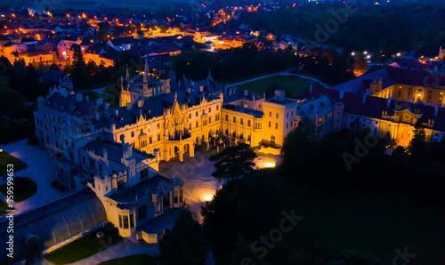 View from drone of impressive medieval Palace in Lednice village at twilight, South Moravia, Czech Republic photo