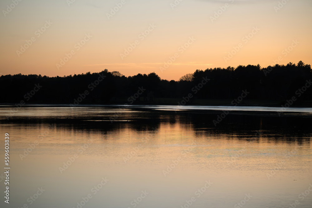 Fototapeta premium Sunset at a lake