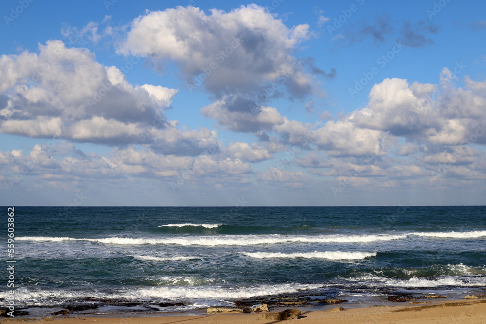 Rain clouds in the sky over the Mediterranean Sea in northern Israel.