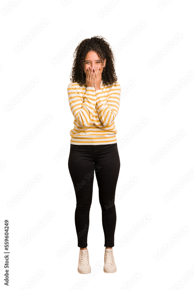 Young african american woman with curly hair cut out isolated laughing about something, covering mouth with hands. Young african american woman with curly hair cut out isolated laughing about something, covering mouth with hands.