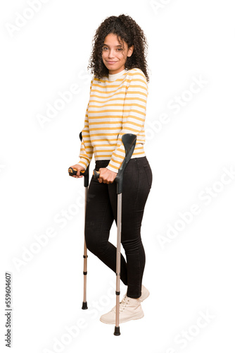 Canvastavla Full body young african american woman with crutches isolated