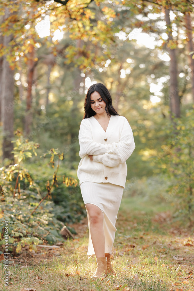 Portrait of attractive smiling caucasian brunette woman. The face of a happy and relaxing beautiful woman with long hair outdoor. Looking Happy, feeling liberty. Ukrainian Girl. Portrait of attractive smiling caucasian brunette woman. The face of a happy and relaxing beautiful woman with long hair outdoor. Looking Happy, feeling liberty. Ukrainian Girl.