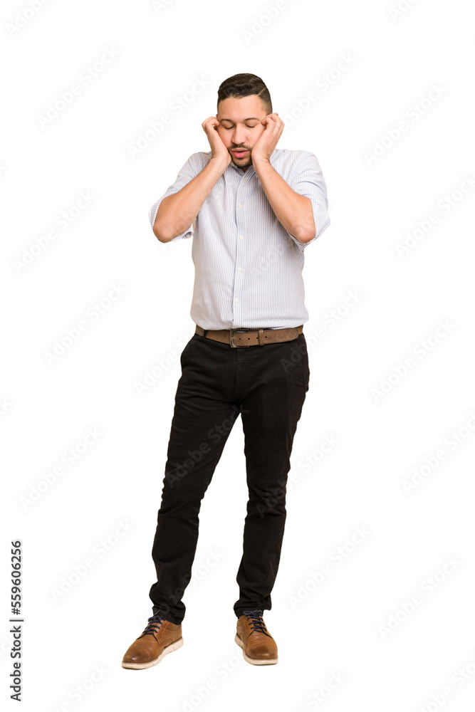 Fototapeta premium Full body adult latin man cut out isolated covering ears with hands.