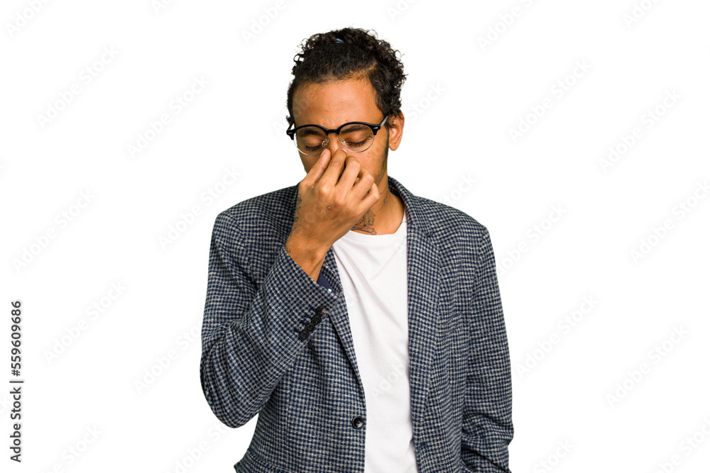 Young African American man isolated having a head ache, touching front of the face. Young African American man isolated having a head ache, touching front of the face.