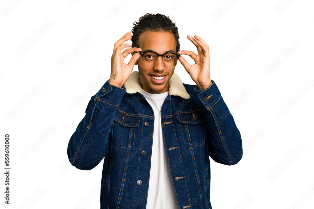 Young African American man isolated excited keeping ok gesture on eye. Young African American man isolated excited keeping ok gesture on eye.