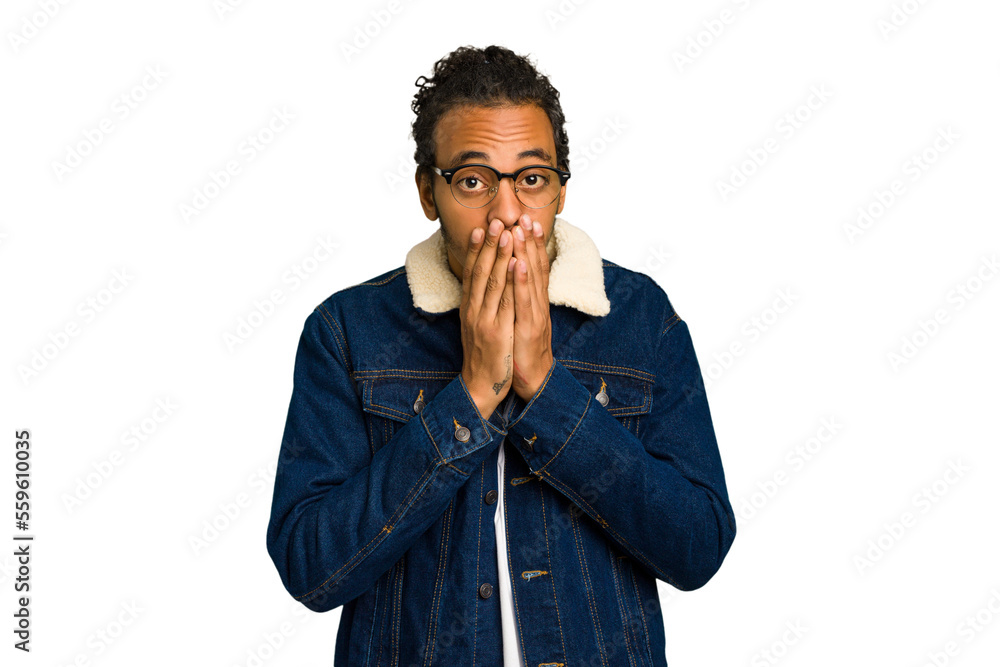 Young African American man isolated shocked covering mouth with hands. Young African American man isolated shocked covering mouth with hands.