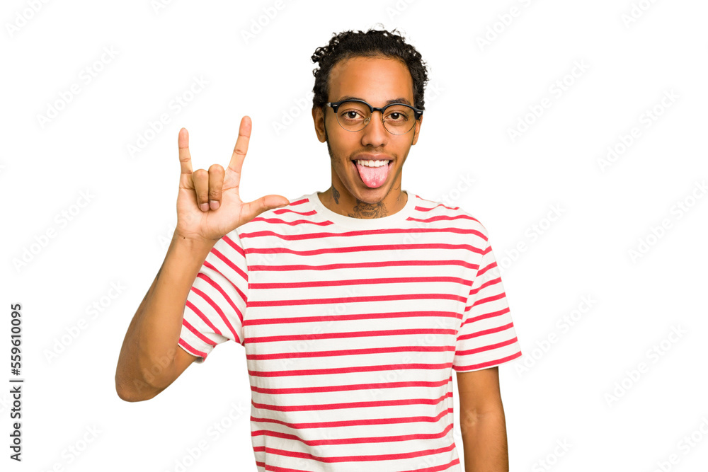 Young African American man isolated showing rock gesture with fingers Young African American man isolated showing rock gesture with fingers