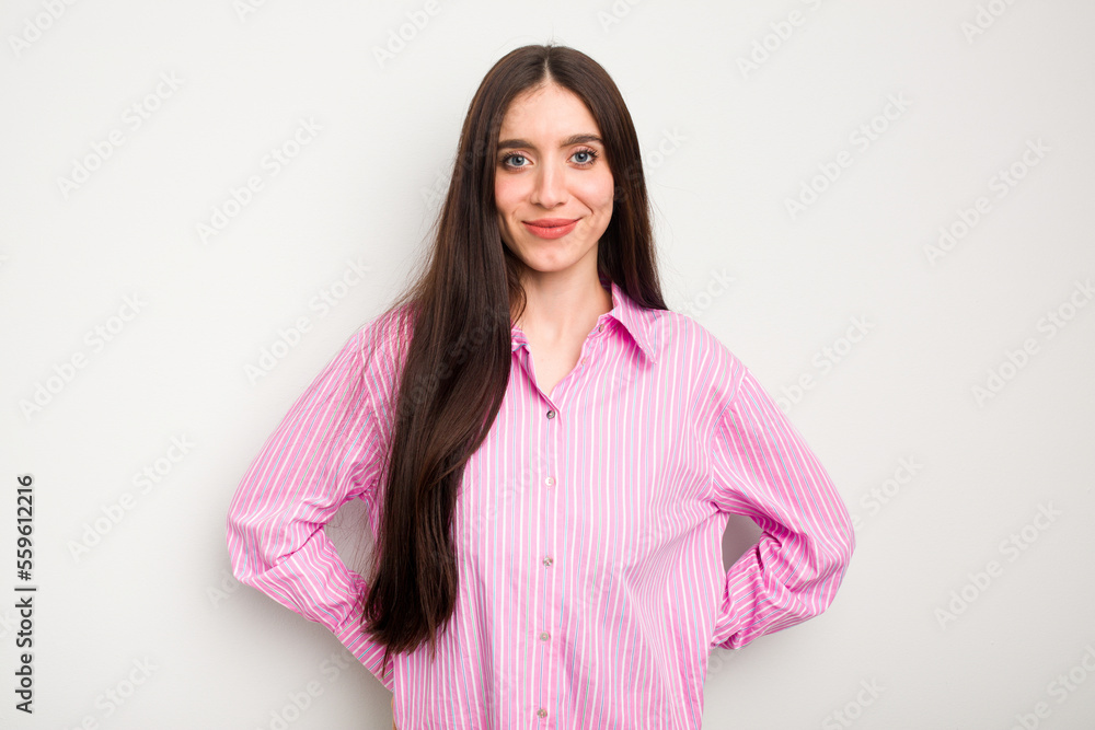 Fototapeta premium Young caucasian woman isolated on white background happy, smiling and cheerful.