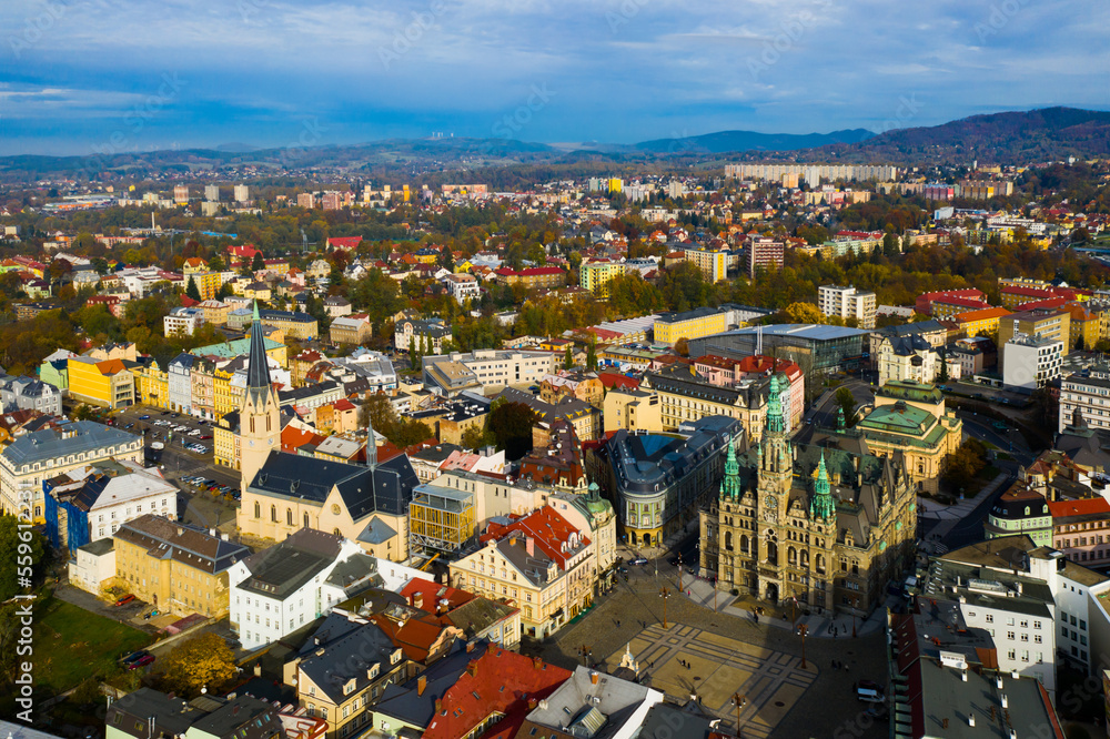 Aerial view of residential districts of Liberec city and grandiose building of Town Hall in autumn day, Czech Republic