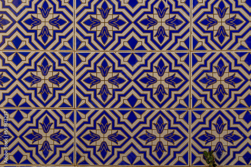  background of white-blue ceramic tiles with classic spanish patterns