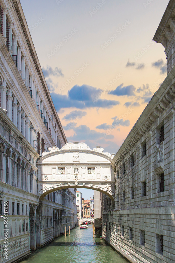 Beautiful view of the Bridge of sighs over one of the Venetian canals in Venice, Italy