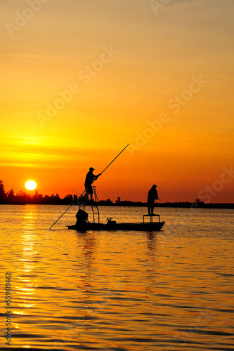 Fly fishing at sunset photo