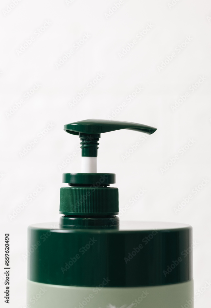 Shampoo bottle with dispenser on white. Shampoo bottle with dispenser on white.
