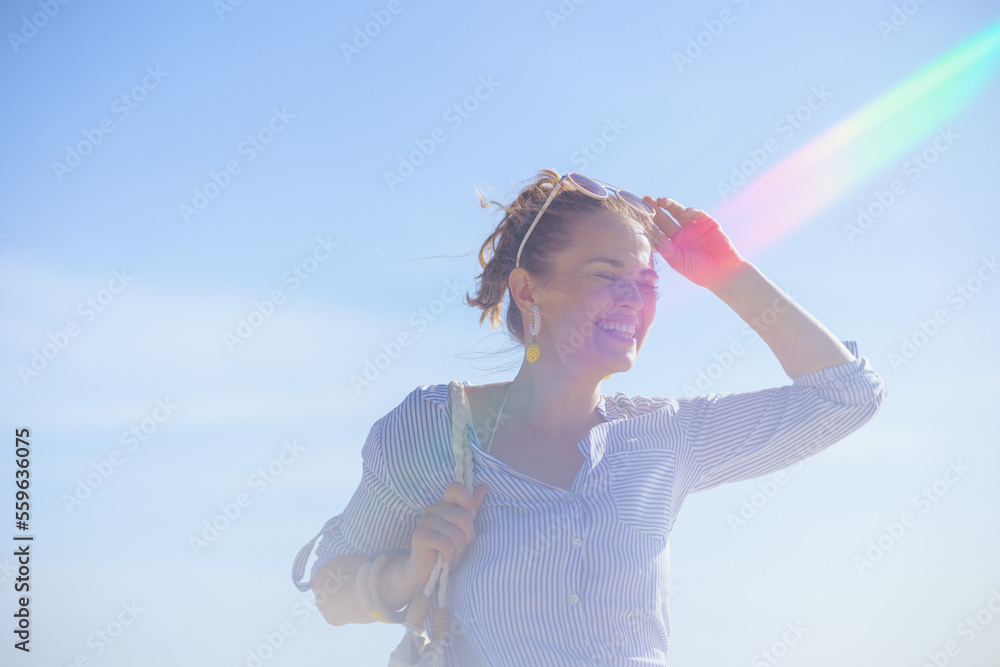 happy modern woman at beach having fun time happy modern woman at beach having fun time