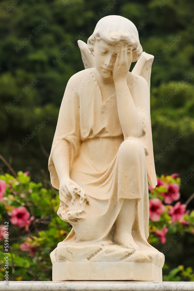 Rio de Janeiro, RJ, Brazil, 2023 - Statuary at Saint John The Baptist Cemetery, in Botafogo district, one of the biggest graveyards in Rio de Janeiro Rio de Janeiro, RJ, Brazil, 2023 - Statuary at Saint John The Baptist Cemetery, in Botafogo district, one of the biggest graveyards in Rio de Janeiro