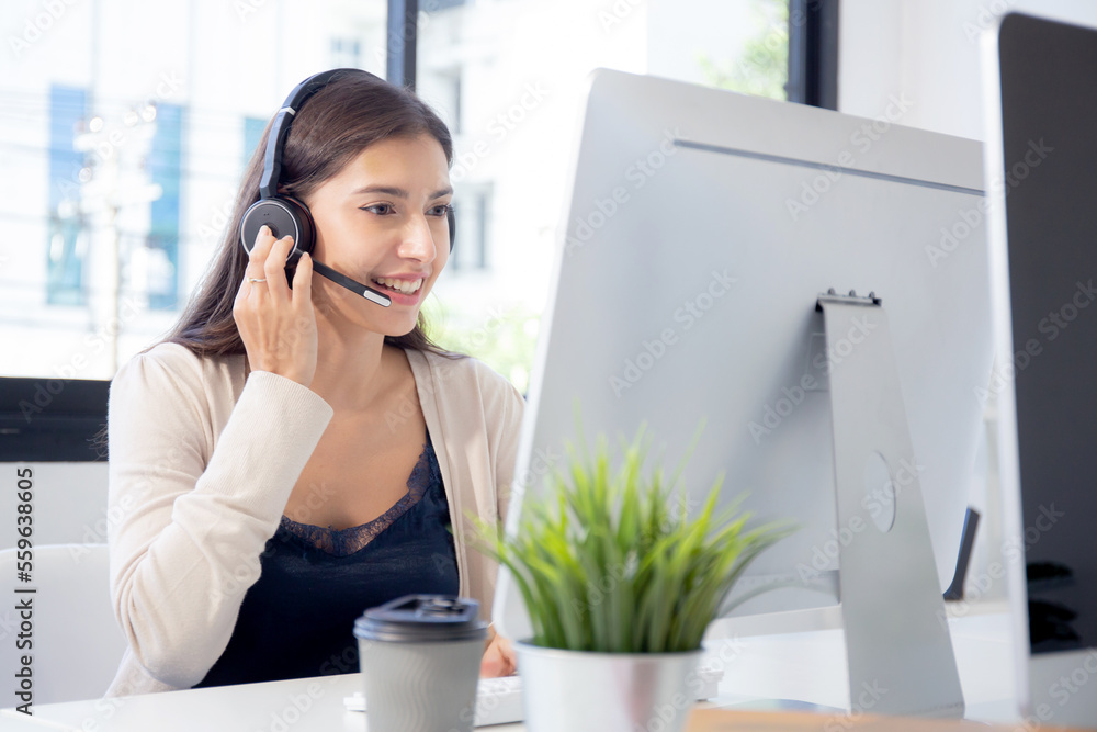 Customer service with friendly, businesswoman is call center and operator for support client, assistance and consultant, adviser helpdesk and contact, woman wearing headset, business concept. Customer service with friendly, businesswoman is call center and operator for support client, assistance and consultant, adviser helpdesk and contact, woman wearing headset, business concept.