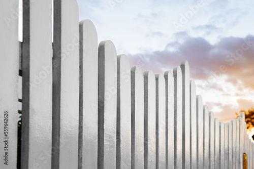 Beautiful white wooden fence against sky outdoors