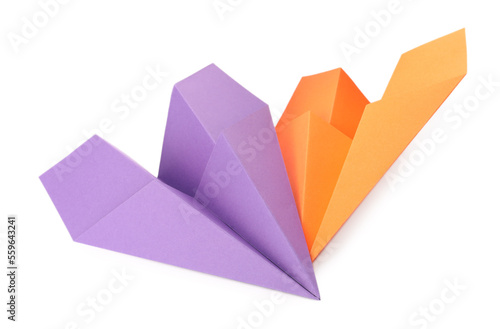 Handmade purple and orange paper planes isolated on white