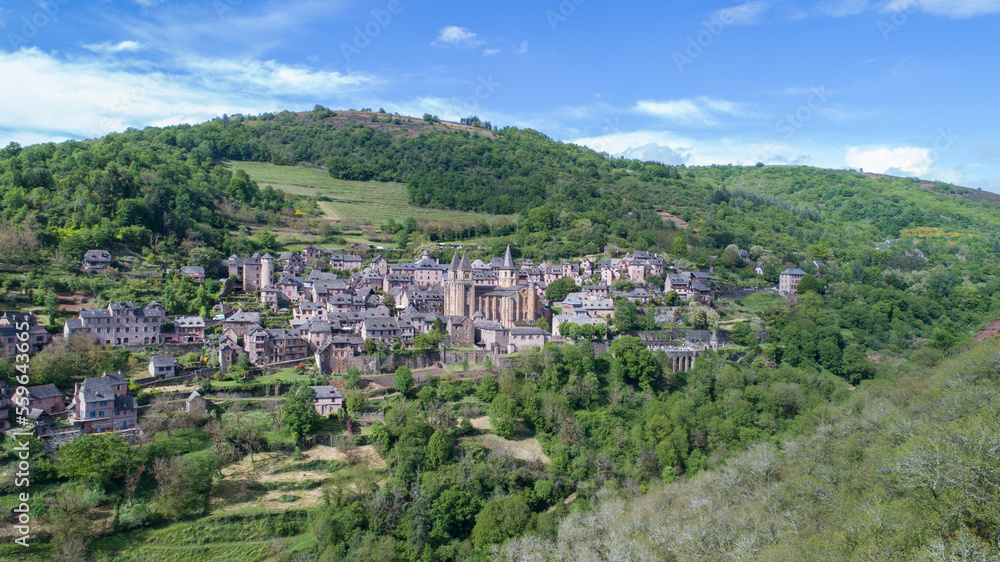 View of a valley with forest and hills near Conques, Aveyron, France