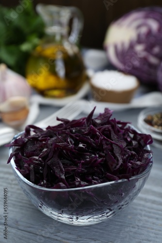 Tasty red cabbage sauerkraut on light grey wooden table