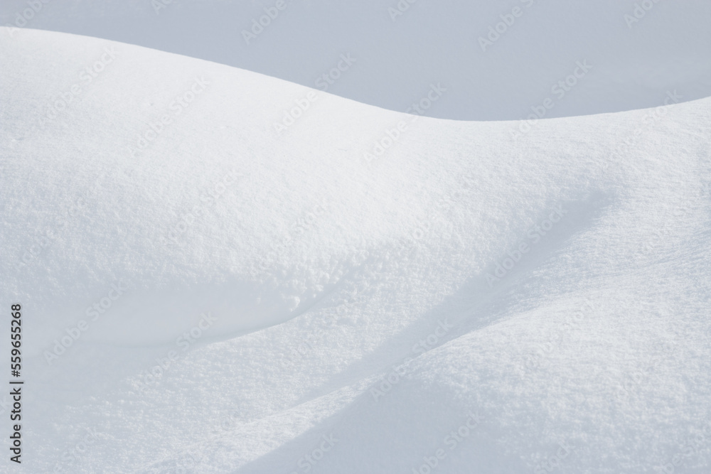 Abstract white curves in winter snow