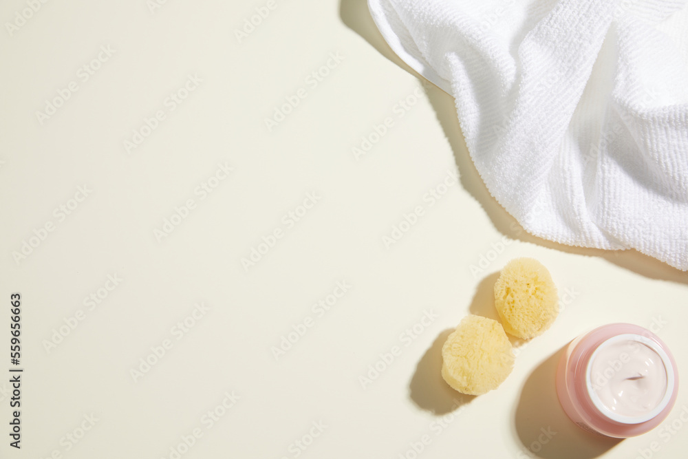 Obraz premium composition of bathroom object on light beige background. simple, copy space. top view.