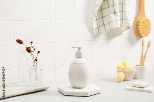 bathroom with white tile wall and bath objects. space for text  copy space