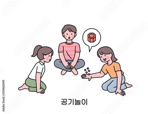 Korean childhood games. The children are sitting together and playing jackstone. play with small stones Korean translation five stones game