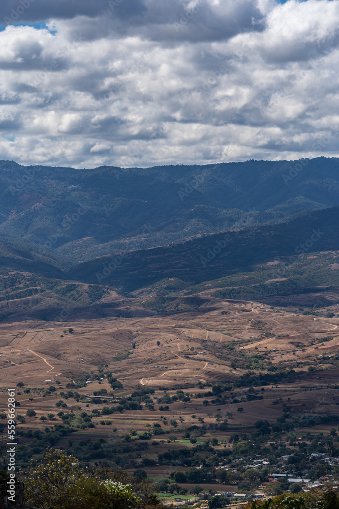 Beautiful view of the large Mexican city of Oaxaca from Monte Alban. View of the endless mountain peaks.