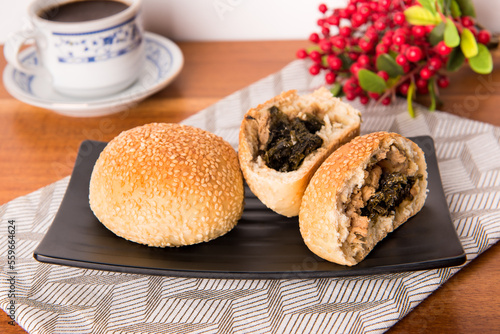 Kompyang bread or Kompia or Guang Bing, a typical Chinese bread that is popular in Indonesia, both filled with meat and empty. Its signature with a sprinkling of sesame on top photo