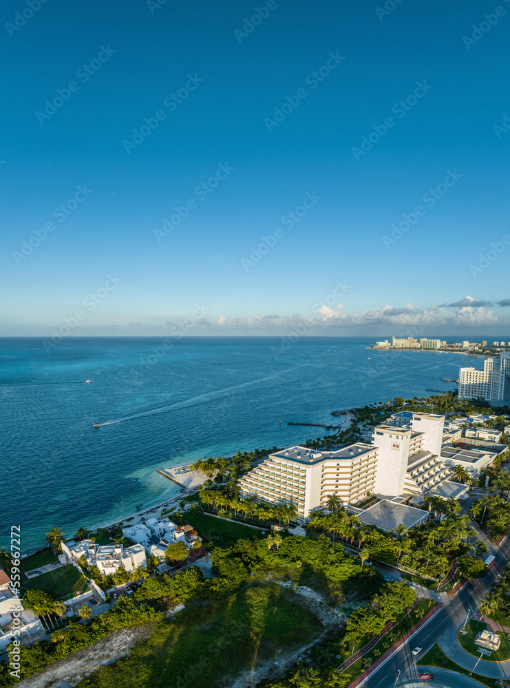 Aerial view of the beautiful coastline of Cancun, Mexico. Hotel zone. Sunset.