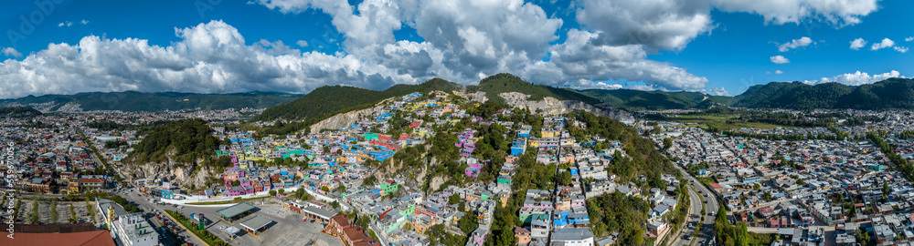 Aerial view of colorful mountain village of San Cristobal in Mexico. Panorama.