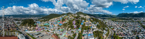 Aerial view of colorful mountain village of San Cristobal in Mexico. Panorama. © nikwaller