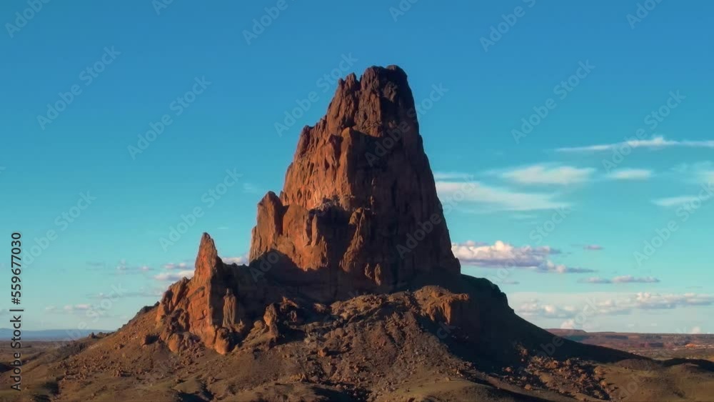 Arid Desert and Stone Buttes in Monument Valley, Arizona Arid Desert and Stone Buttes in Monument Valley, Arizona
