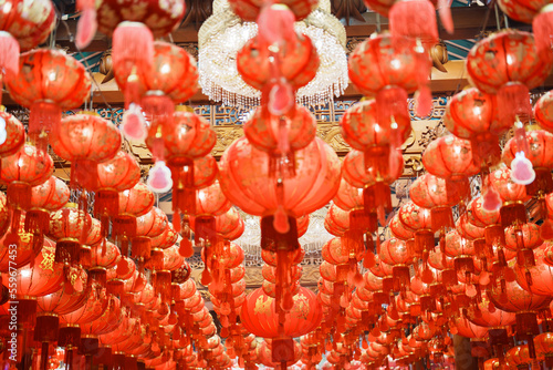 Chinese red Lanterns in temple, happy Lunar New Year holiday. Chinese sentence means happiness, healthy, Lucky and Wealthy photo