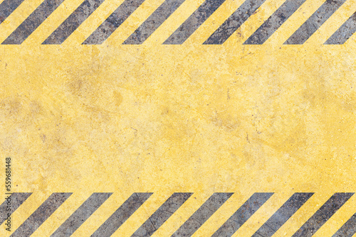 Grunge yellow and black diagonal stripes. Industrial warning background, warn caution, construction, safety