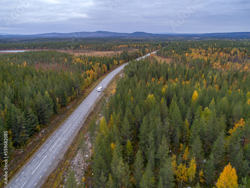 drone footgage Car Camping Caravan driving road lake Swedish Lapland fall ruska colors National Park Sweden