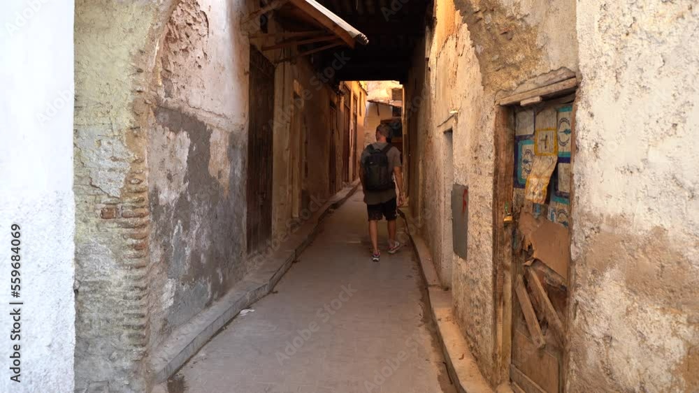 Man walking in the streets in Morocco Man walking in the streets in Morocco